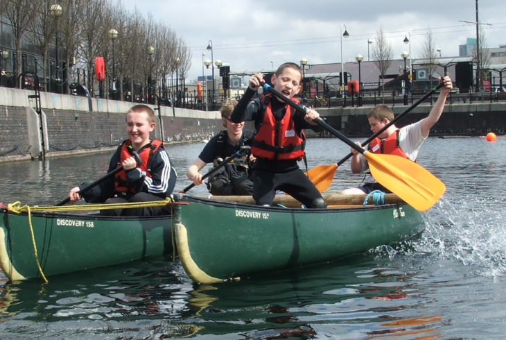 Young people canoeing