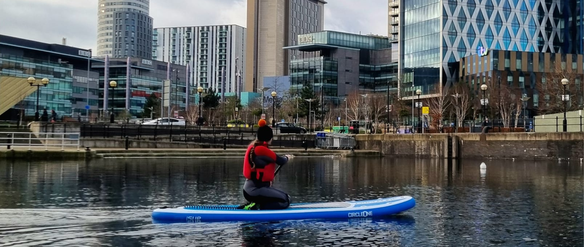 Person paddleboarding