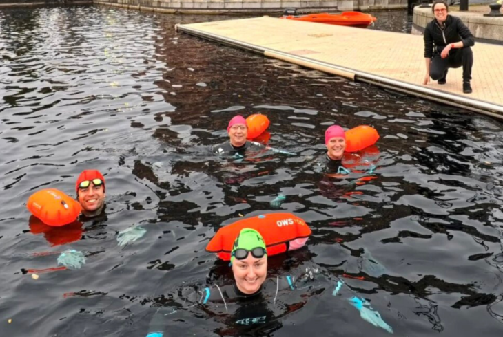 People in water for 121 coaching session