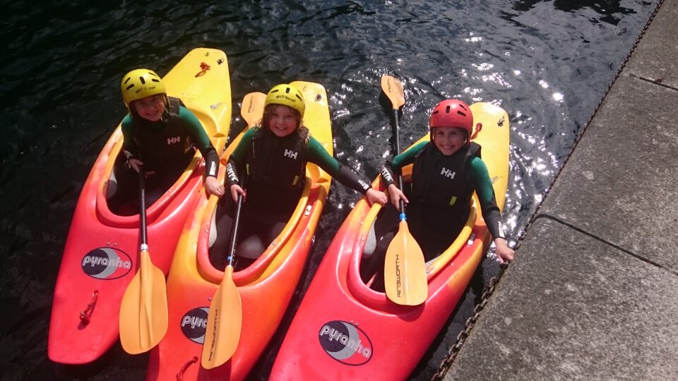 Children in kayaks
