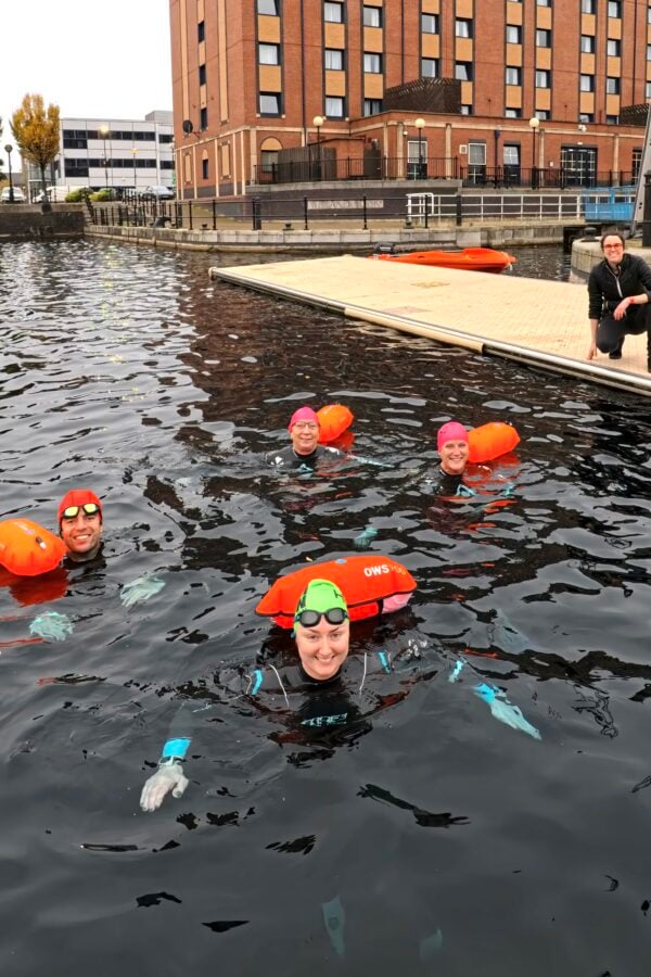 People in water during open water swimming session