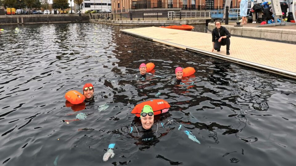 People in water during open water swimming session